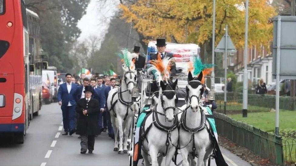 Funeral procession for Joe Rooney