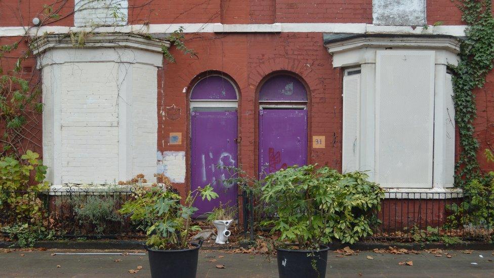 Derelict houses on Cairns Street