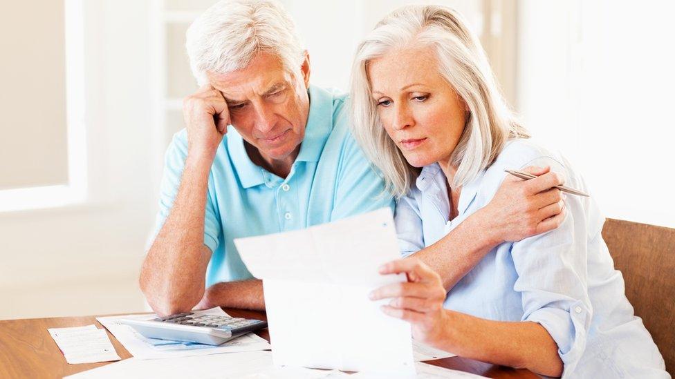 Couple looking at forms.