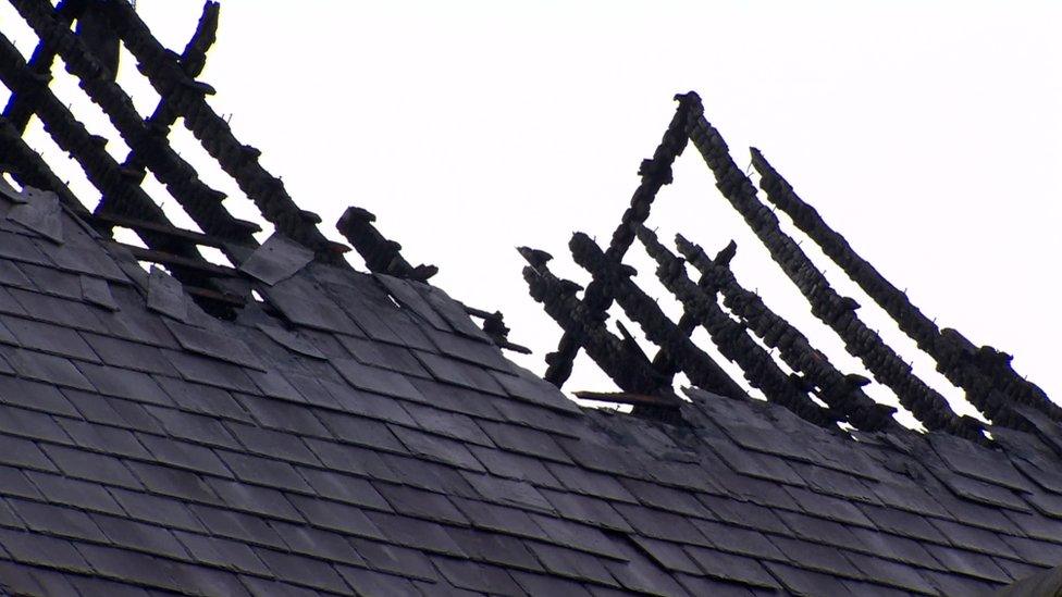 Damage to the building's roof