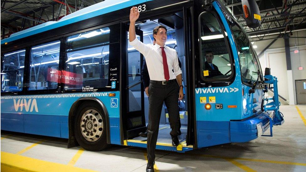 Liberal leader Justin Trudeau steps off a bus arriving at a campaign event at the VIVA Bus Terminal Friday, Sept. 4, 2015 in Richmond Hill, Ontario, Canada.