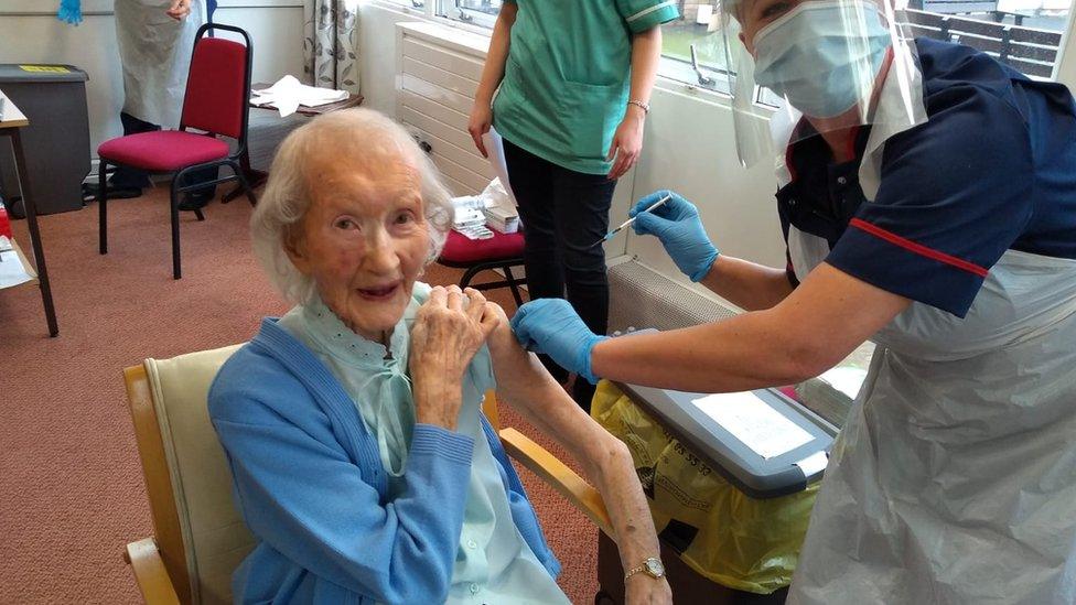 Mary Kier receiving her vaccination