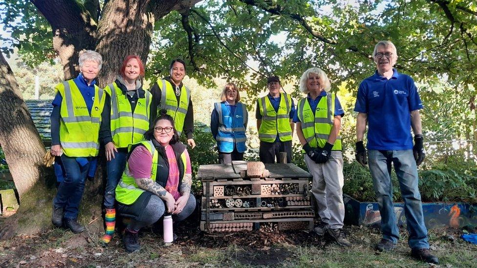 Building a bug hotel by the canal