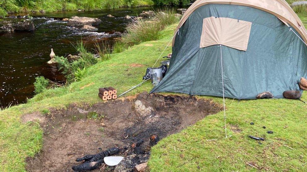 Tent with abandoned fire pit