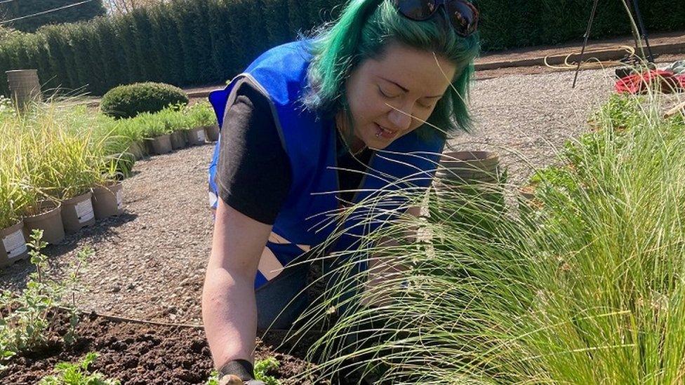 Holly Matthews working at the coronation garden