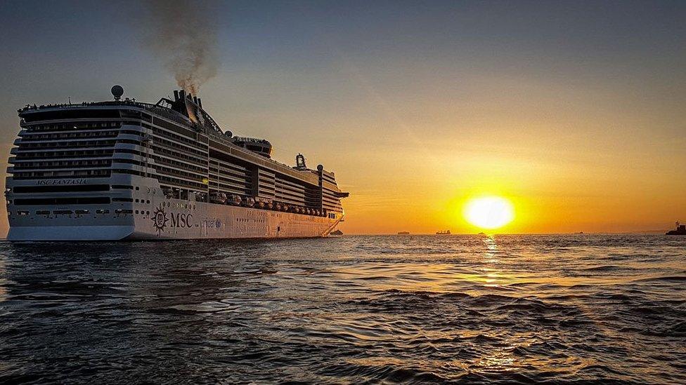 Cruise ship heading out to sea