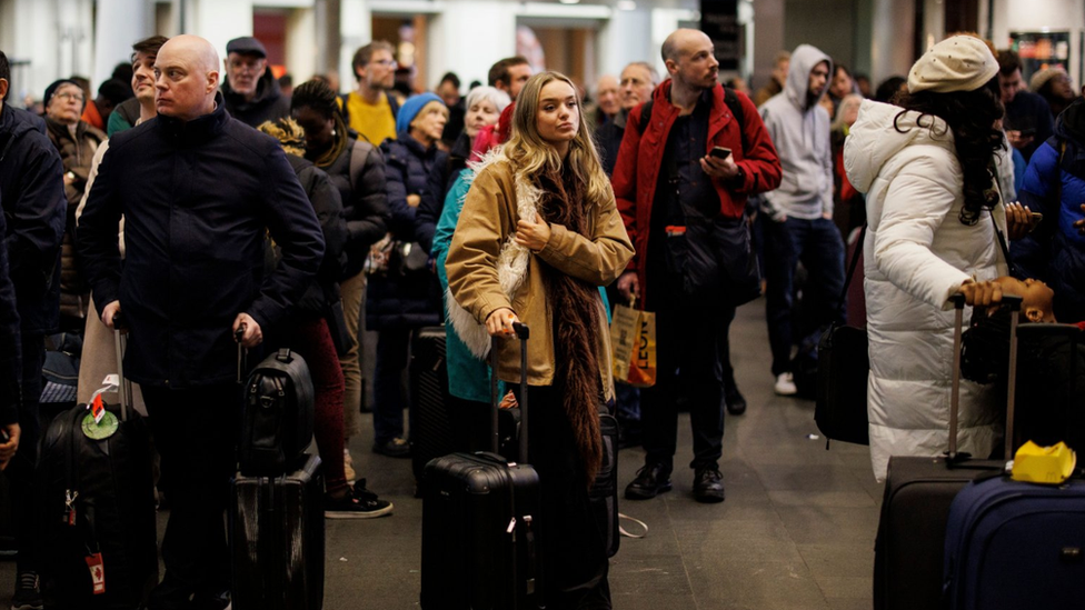 Passengers wait at King's Cross whilst signalling issues prevented train services running on various routes from Kings Cross and St Pancras