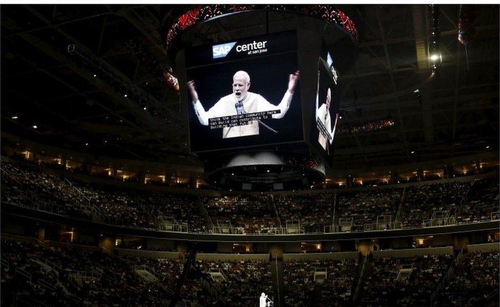 Indian Prime Minister Narendra Modi (C) addresses the crowd during a community reception at SAP Center in San Jose, California September 27, 2015.