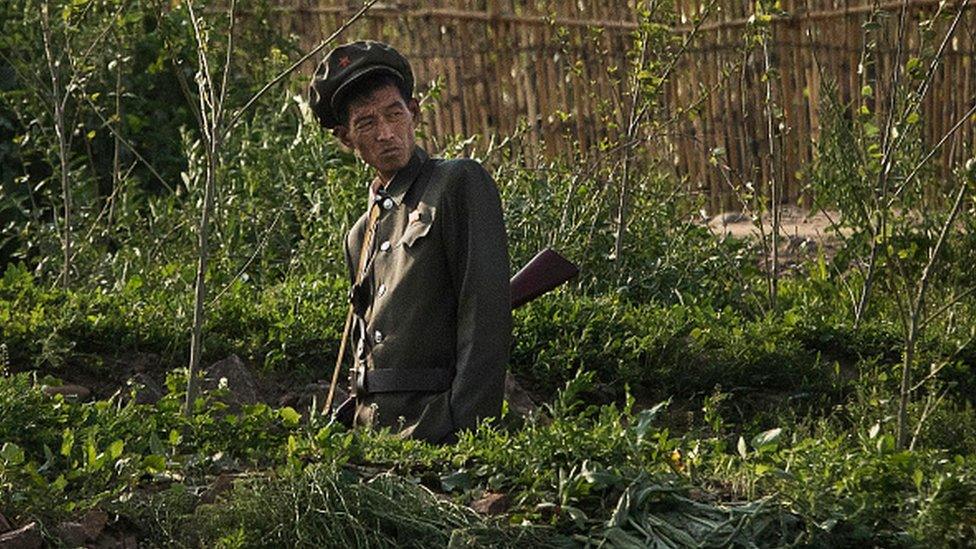 North Korean soldier patrol the Chinese border