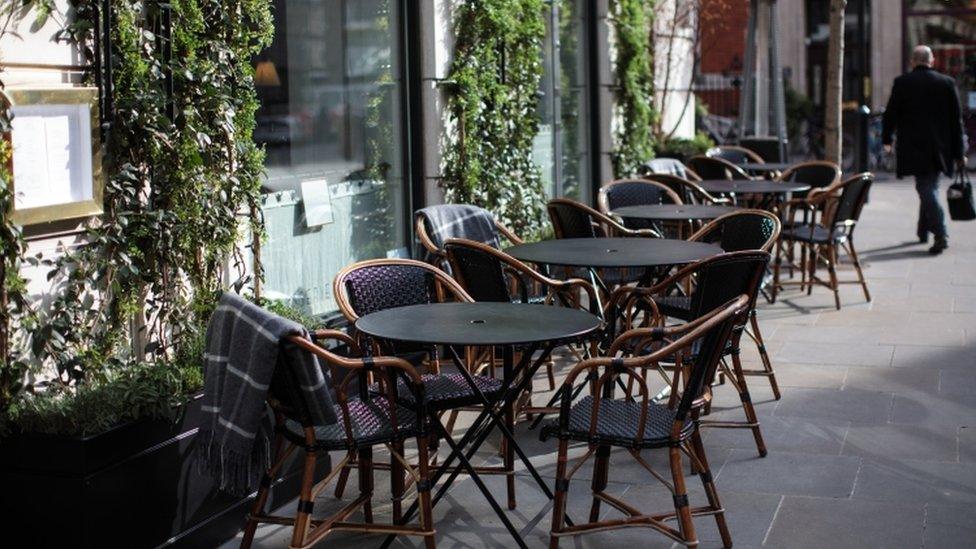 restaurant chairs on the street