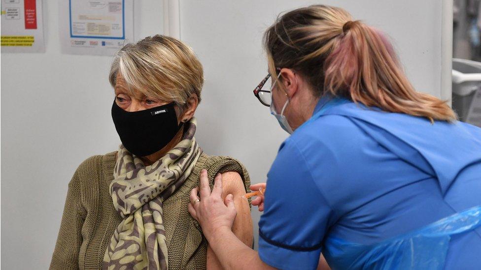 Rita Passey receives an injection of a Covid-19 vaccine at the NHS vaccine centre that has been set up at the Millennium Point centre in Birmingham.