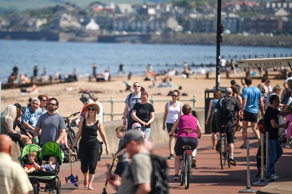 Crowds walking near Portobello beach, Edinburgh