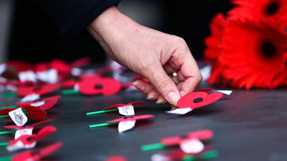 Poppies are laid on the Tomb of the Unknown Warrior during the Anzac Day Dawn Service at Pukeahu National War Memorial Park in Wellington, New Zealand (25 April 2018)