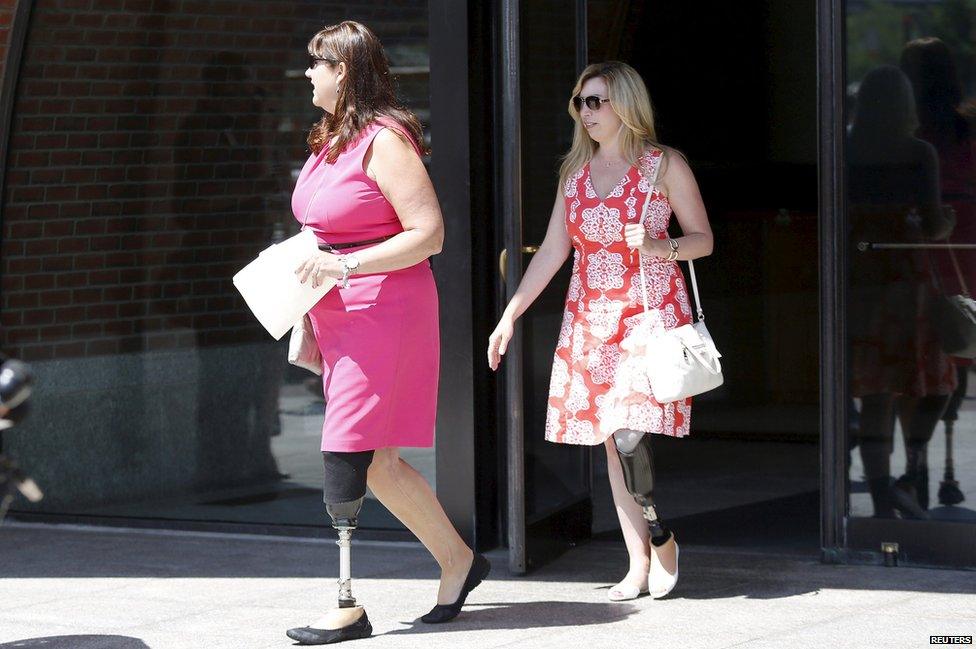 Marathon survivors Karen McWatters (left) and Heather Abbott leave court