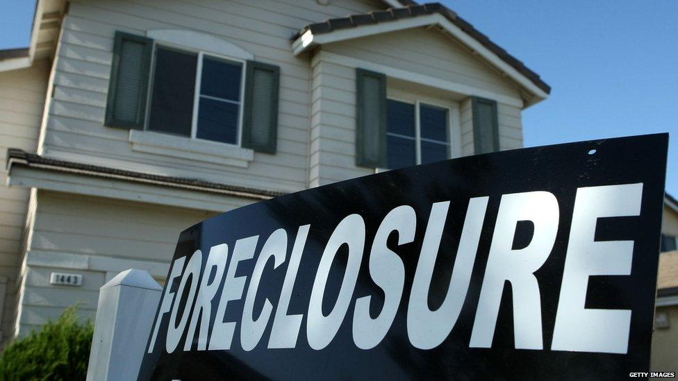 A foreclosure sign is posted in front of a home for sale 29 April, 2008 in Stockton, California