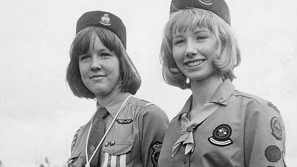 Guides in two different uniforms, from the 1960s and after an update in 1968