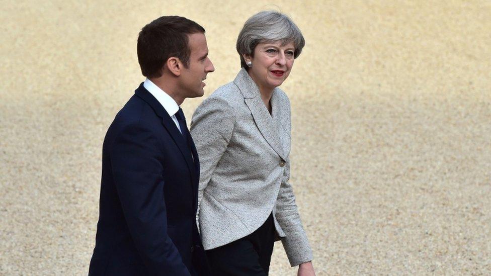 Emmanuel Macron and Theresa May