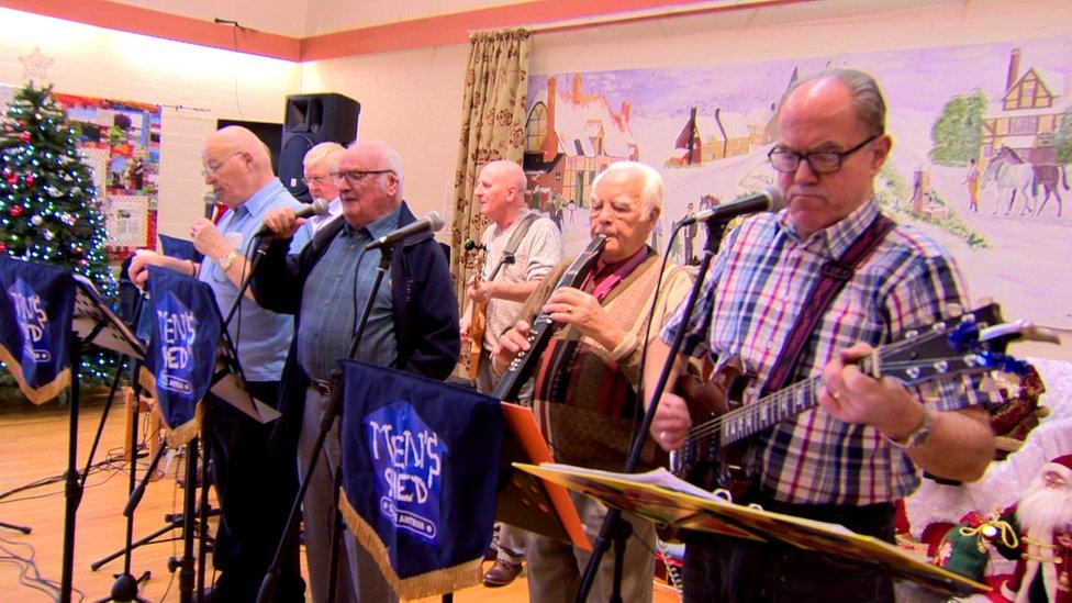 Members of Men's Shed Antrim performing