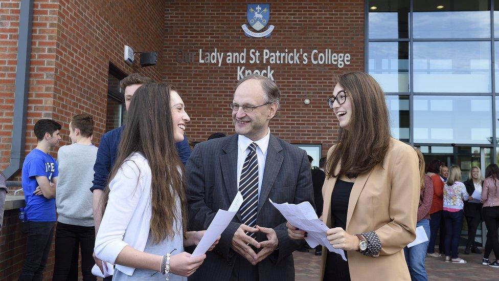 Education Minister Peter Weir visited Our Lady's and St Patrick's College where he congratulated pupils on their results, including Eimear Rogers (left) and Clare Dempsey.