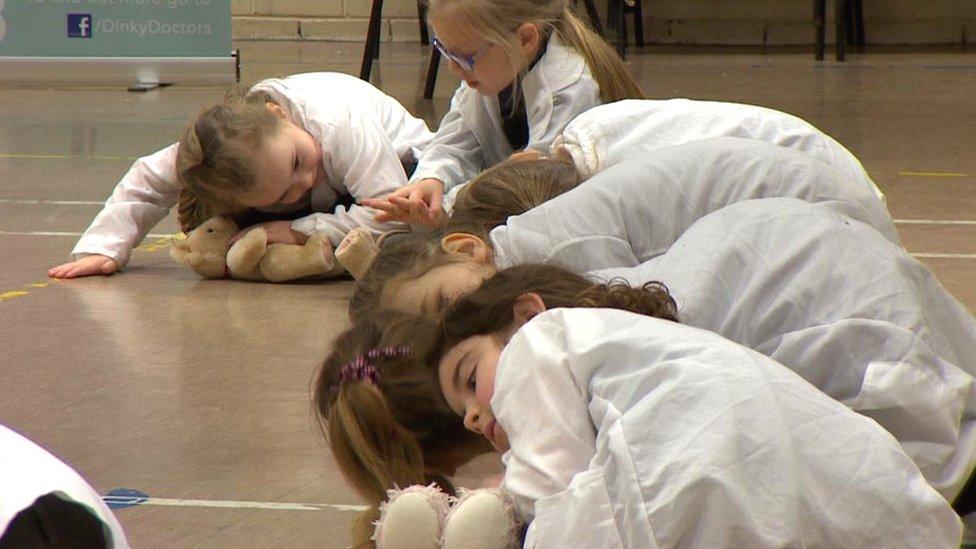 Children learning with teddy bears