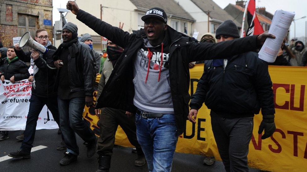 Migrants demonstrate in Calais