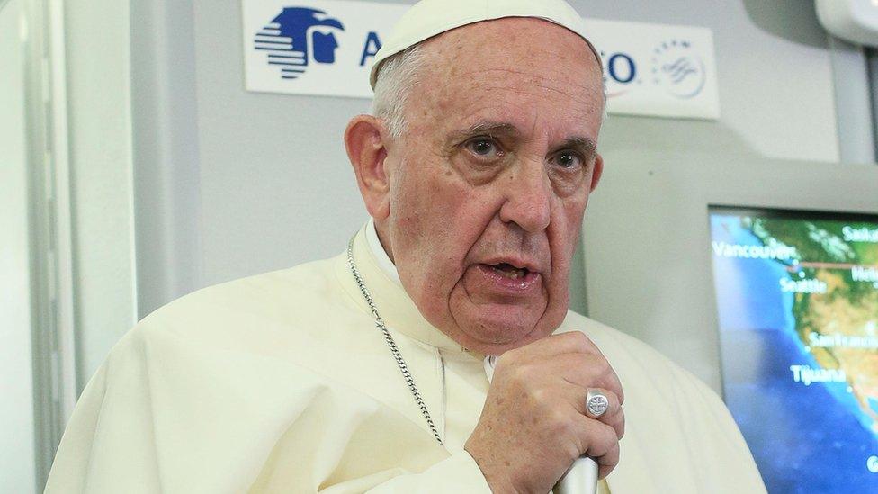 Pope Francis speaks to journalists aboard a flight from Mexico to Italy, on February 18, 2016.