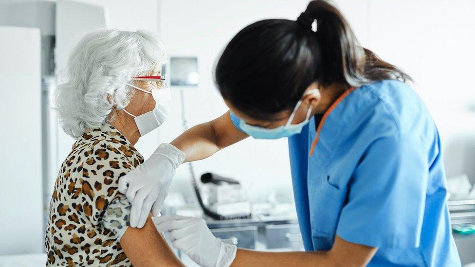 Person getting a vaccine