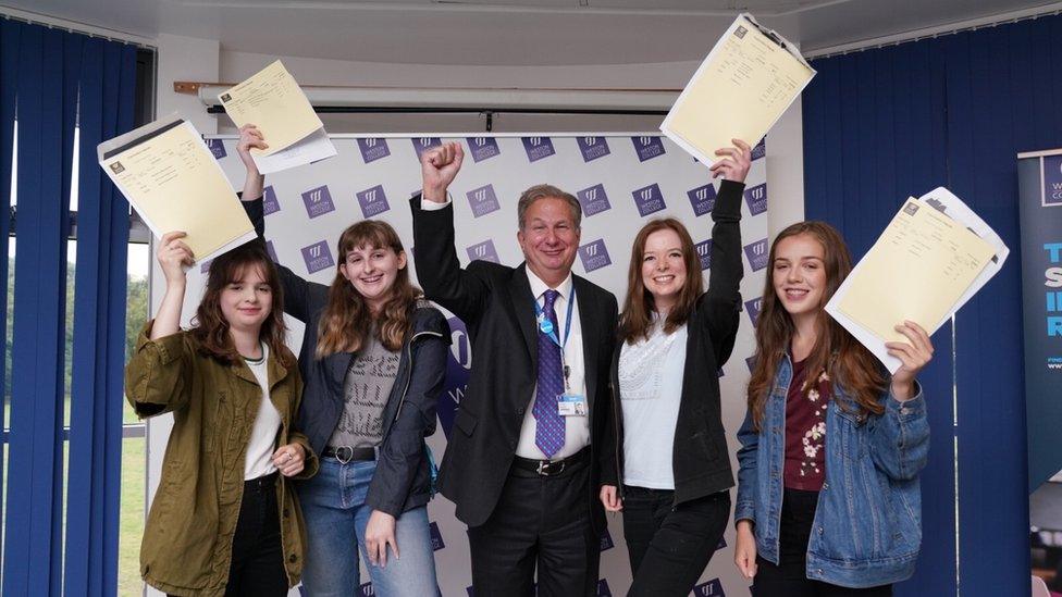 Dr Paul Phillips with top performing A-level students