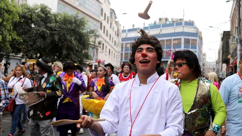 Clowns take part in a parade during Peru's Clown Day celebrations in Lima, Peru May 25, 2018