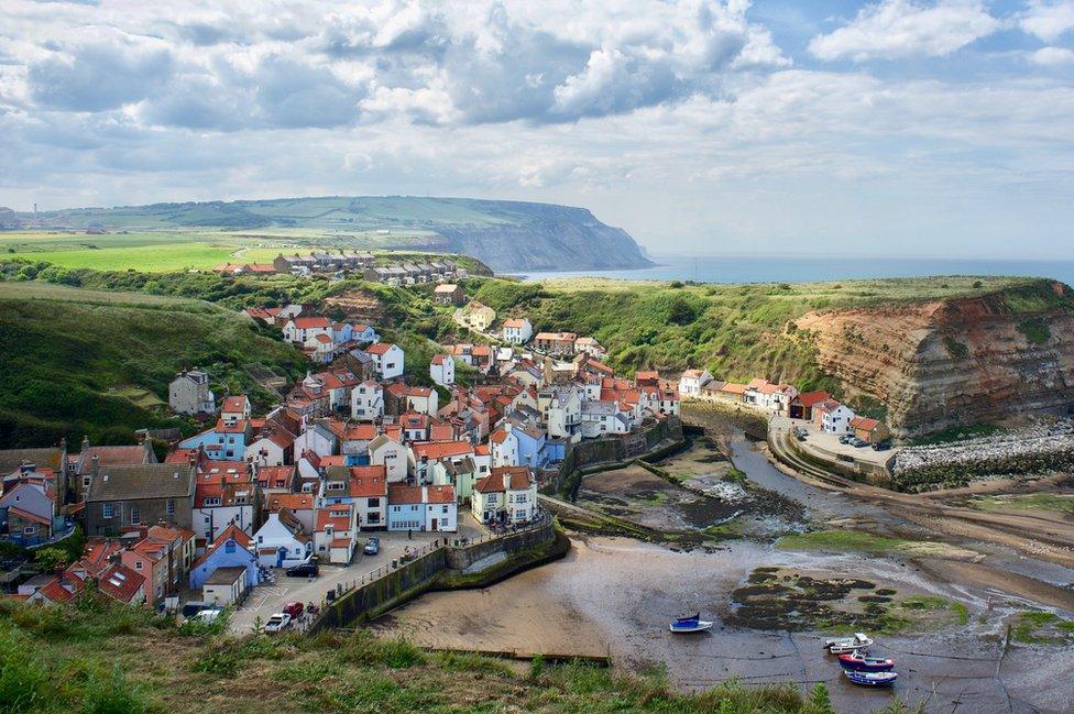 View of Staithes harbour from cliff top