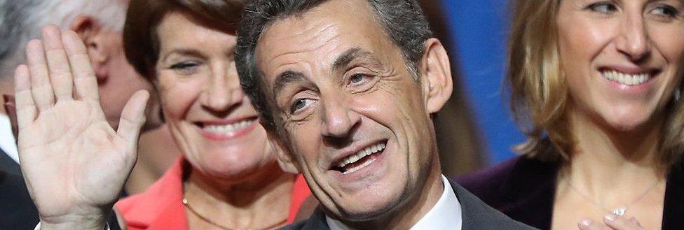 Nicolas Sarkozy, former French president and candidate in the Republicans party primary, waves at a public meeting in Nice on 15 November 2016.