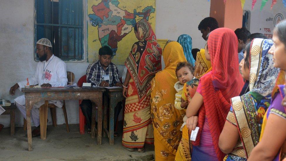 Indian voters queue to cast their ballots at a voting centre in the final stage of state assembly elections in the Bihar village of Thakurganj in Kishanganj district on November 5, 2015. India's poorest state of Bihar is voting in a high-stakes election which Prime Minister Narendra Modi hopes will help his government push