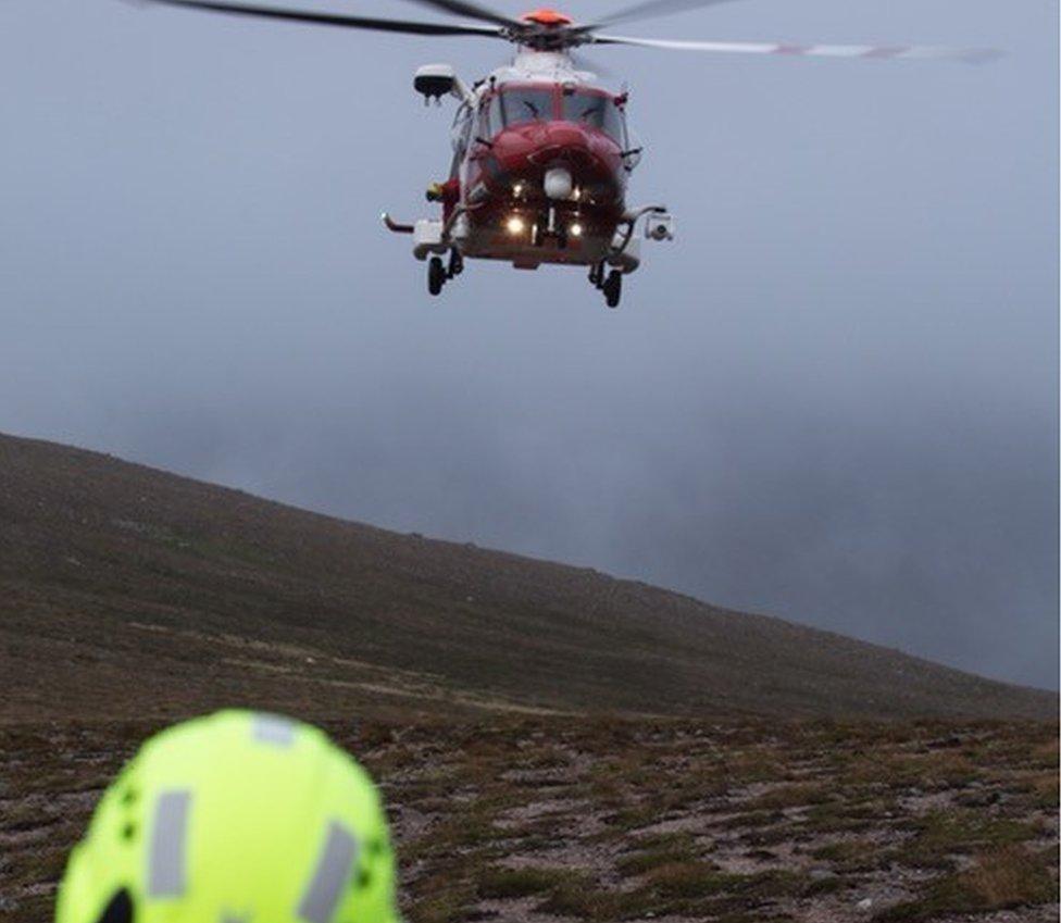 Helicopter lands on mountain