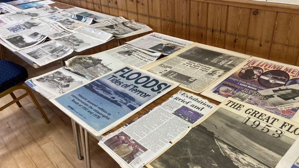 Newspaper cuttings reporting the floods of 1953