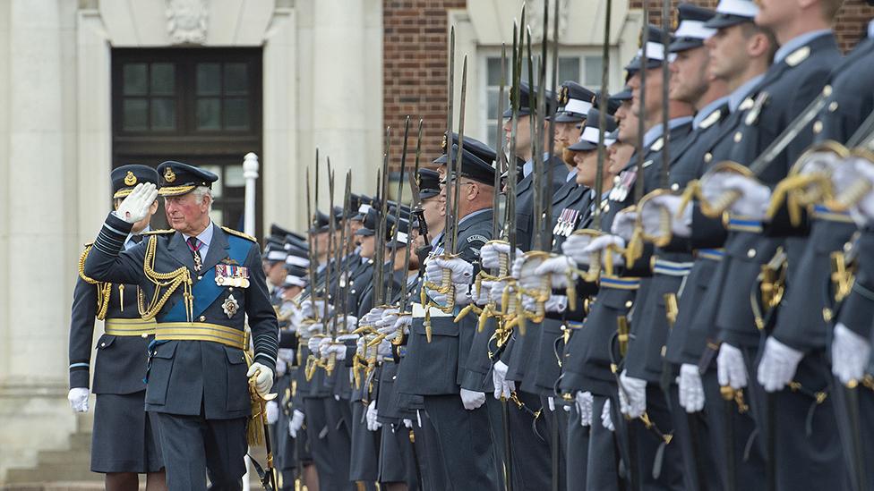 The prince reviews the cadets