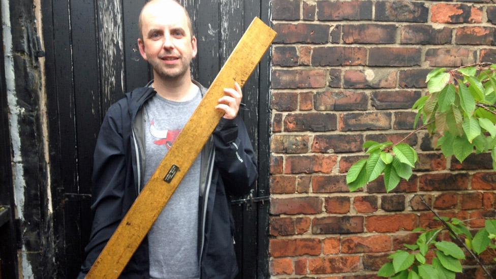 Chris Hughes with Hacienda floorboard