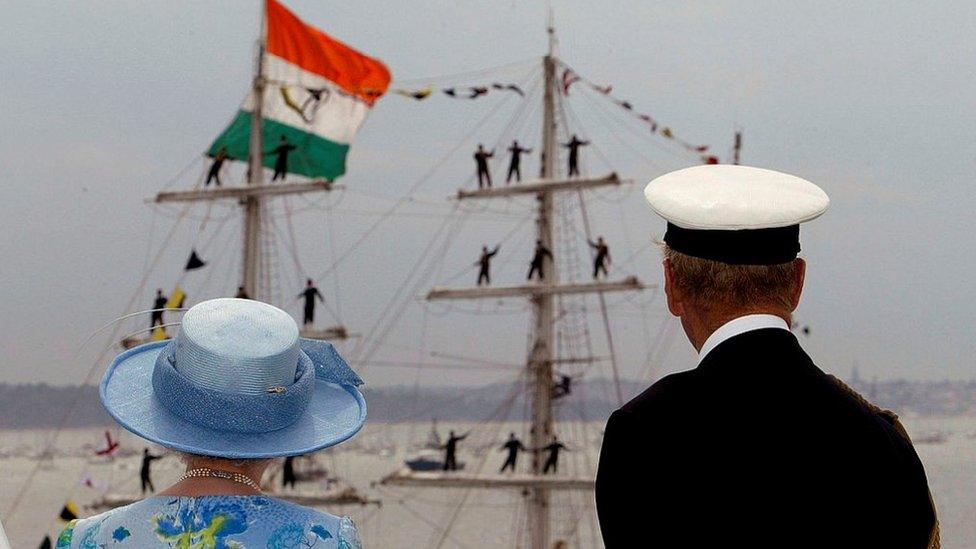 Queen Elizabeth II and The Duke of Edinburgh review the fleet