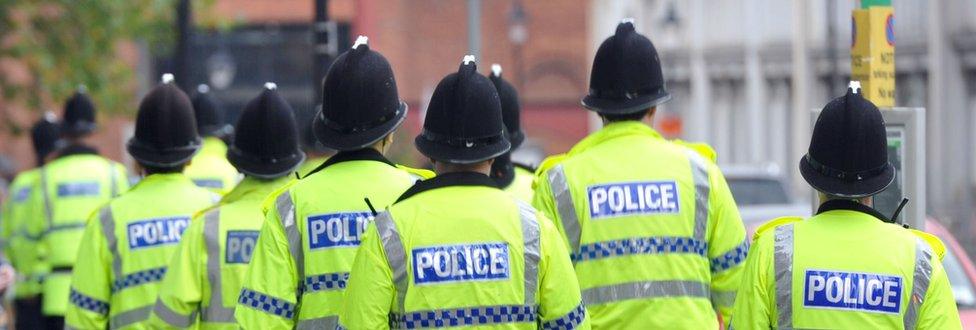 A group of police officers walking