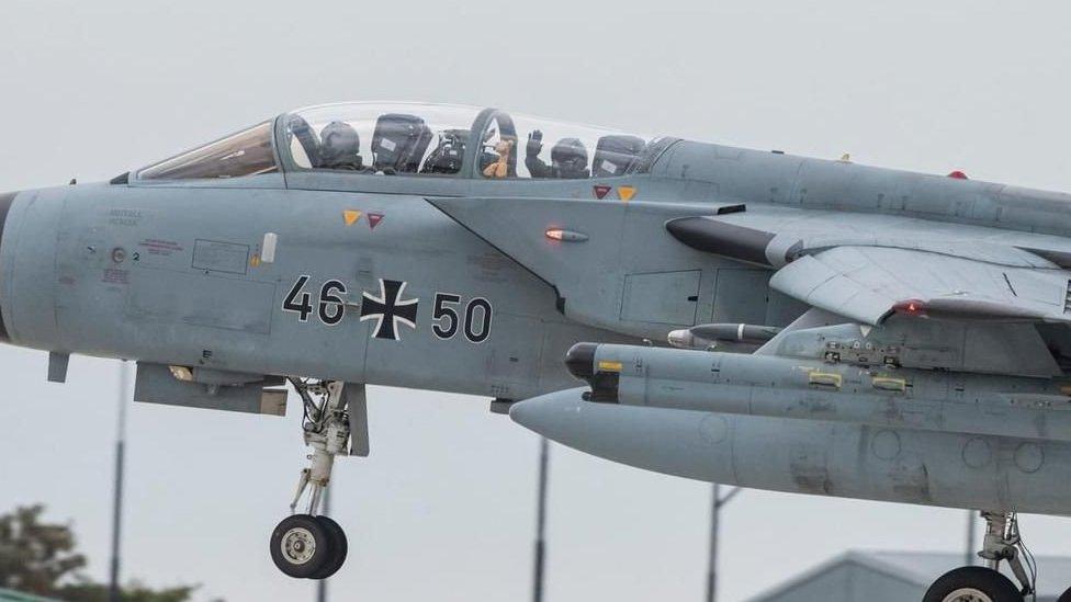 Geoffrey flying with the German Air Force at RAF Waddington