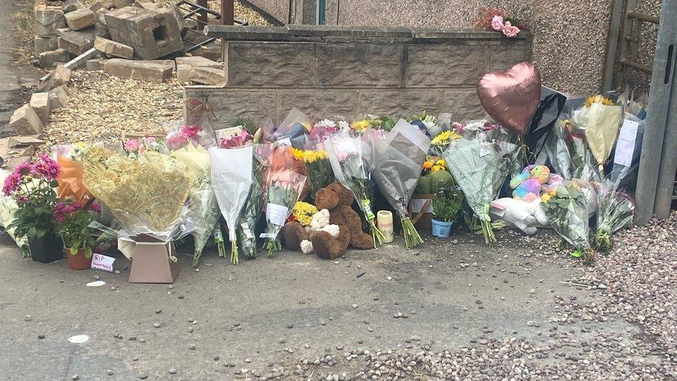 Flowers and tributes at the scene