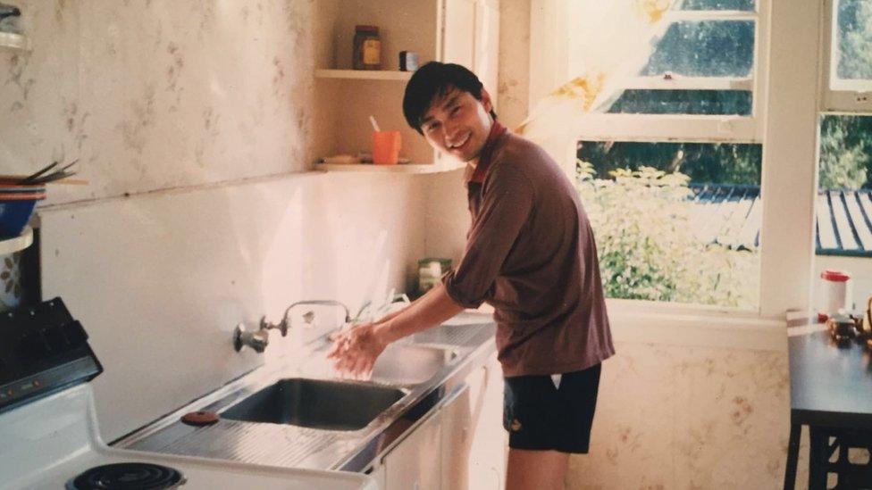 Cong Hui Mao in a kitchen at his Sydney flat in 1990.