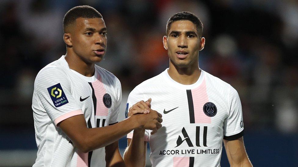 Kylian Mbappe (left) and Achraf Hakimi (right) of PSG