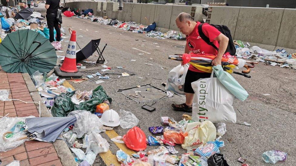 Man picking up trash