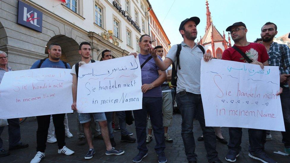 Refugees in Wuerzburg have demonstrated after the attack there, carried out by a 17-year-old asylum seeker