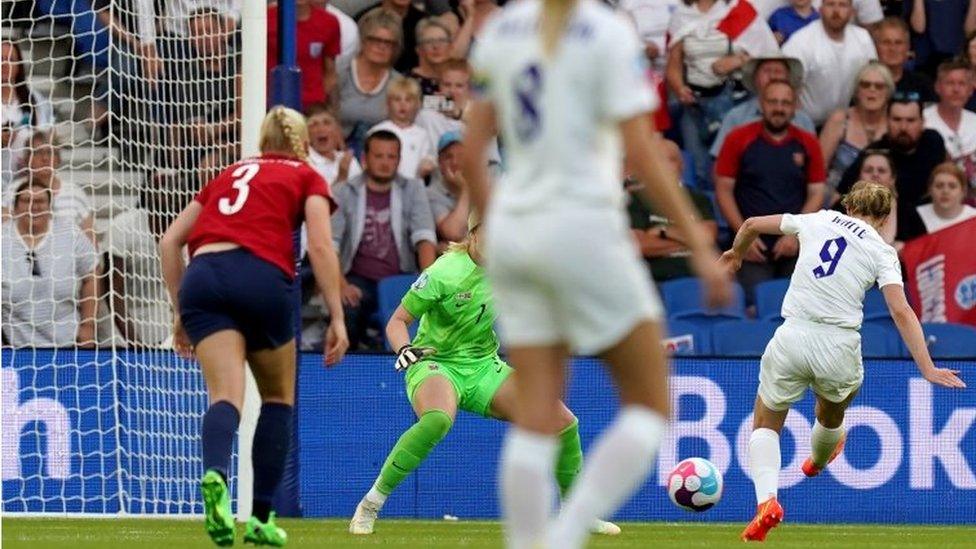 England's Ellen White scores her sides third goal