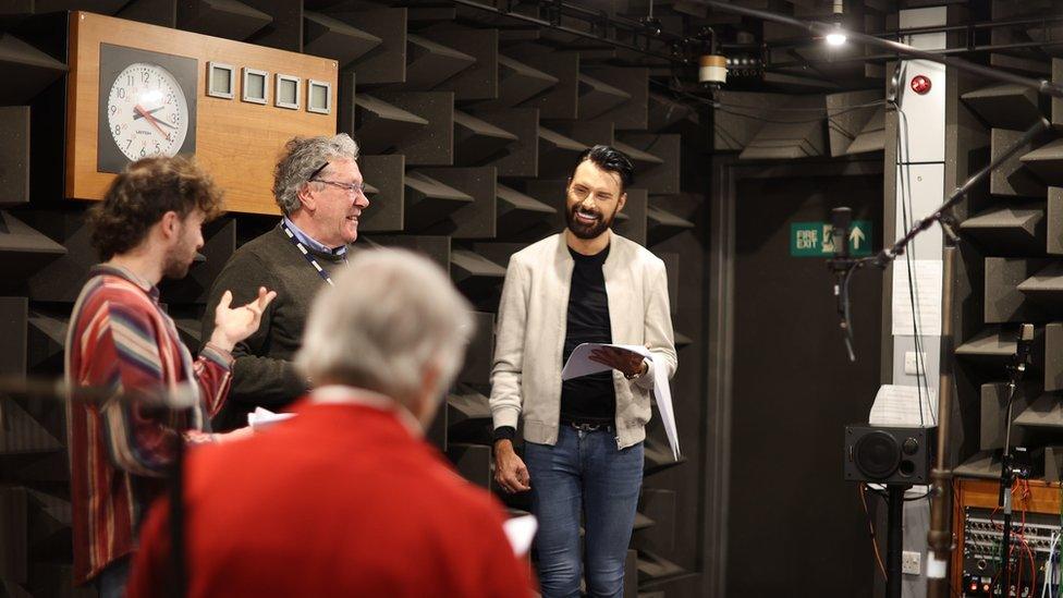 Rylan (left) recording a special Eurovision Song Contest-themed episode of BBC Radio 4's The Archers