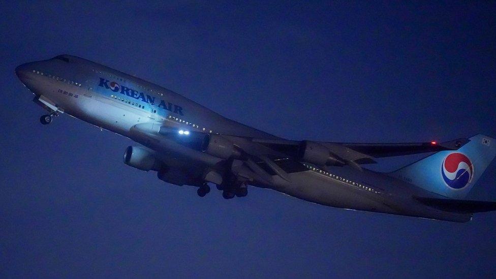 Korean Air flight 9883 takes off for Wuhan, China, from Incheon International Airport