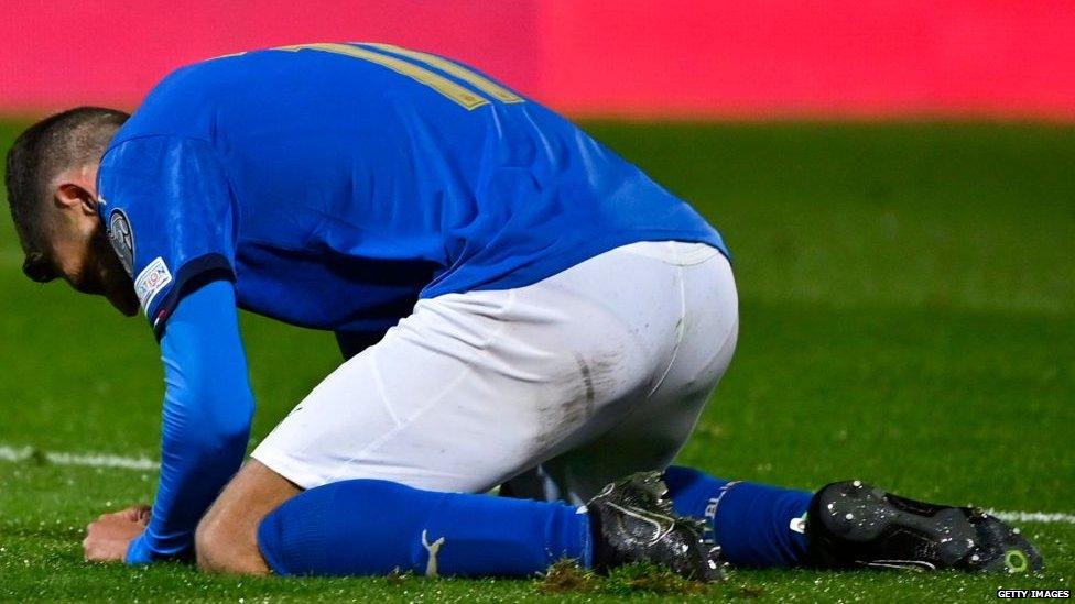 A photo of an Italy player on their knees