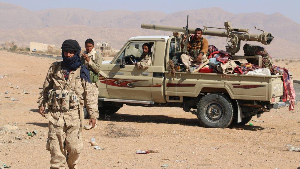 Pro-government fighters hold a Houthi position in the north-east of Yemen. 19 December 2015