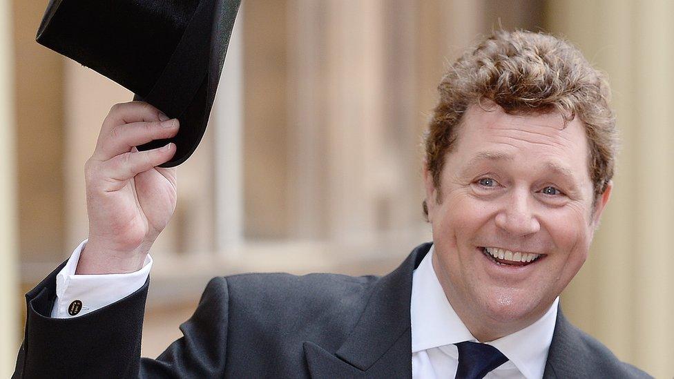 Michael Ball receiving his OBE